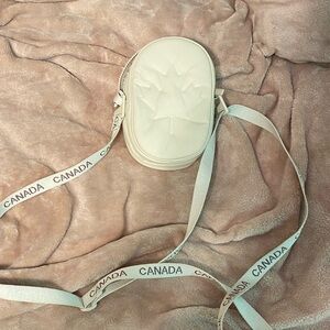 Lululemon Cream Crossbody Bag with Maple Leaf Design